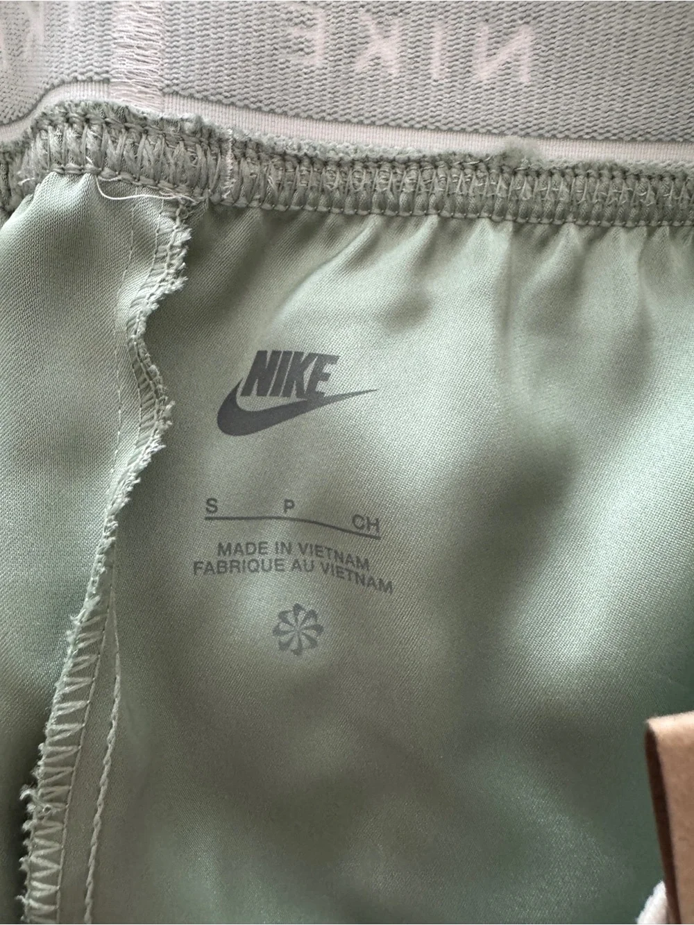 Nike Women's Sage Green Athletic Shorts with White Logo Waistband